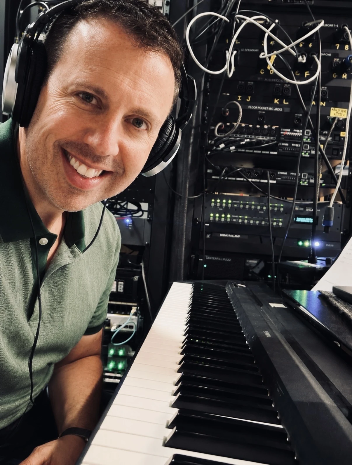 Daniel at a keyboard and technical setup